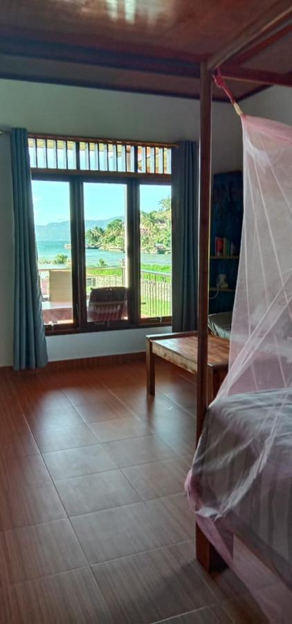 Toba Sunset Bed & Breakfast ตุกตุก ภายนอก รูปภาพ